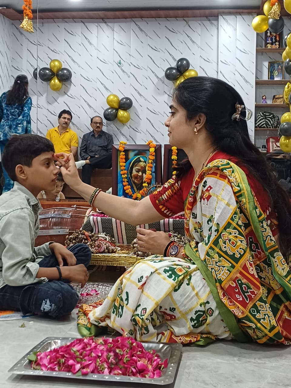 Ghungroo Puja tilak blessing ceremony for a young boy student